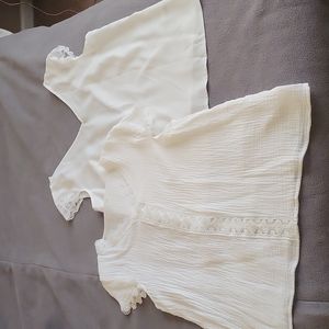2 white shirts with lace